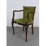Mahogany open armchair with green velvet upholstered back and seat, on cabriole front legs with