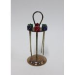 Novelty set of six Epns dice cocktail sticks in a circular stand, 13cm high