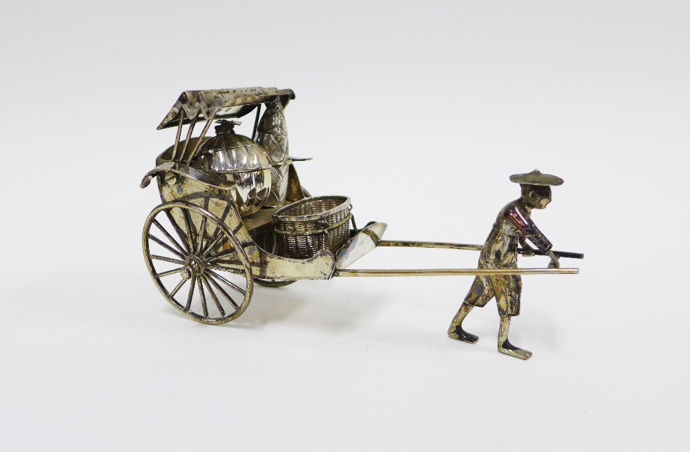 Luen-Wu, Shanghai, a Chinese silver rickshaw with cruets, stamped marks to base, 19cm long