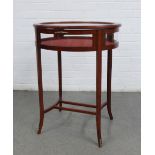 Bijouterie table, with an oval glazed showcase top, on slender cabriole legs with brass mounts