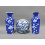 Pair of Chinese blue and white prunus pattern vases, 19cm high , and a dragon pattern blue and white