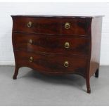 Mahogany serpentine chest,t eh top with moulded edge over three long drawers with brass ring