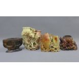 Four soapstone floral carvings with mixed flowers and hollow vessels, tallest 16cm) (a/f)