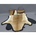 Two vintage leather handbags together with an animal skin pelt / rug (3)