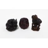 A collection of three wooden netsukes to include a monkey, dragon and ram, tallest 5cm (3)