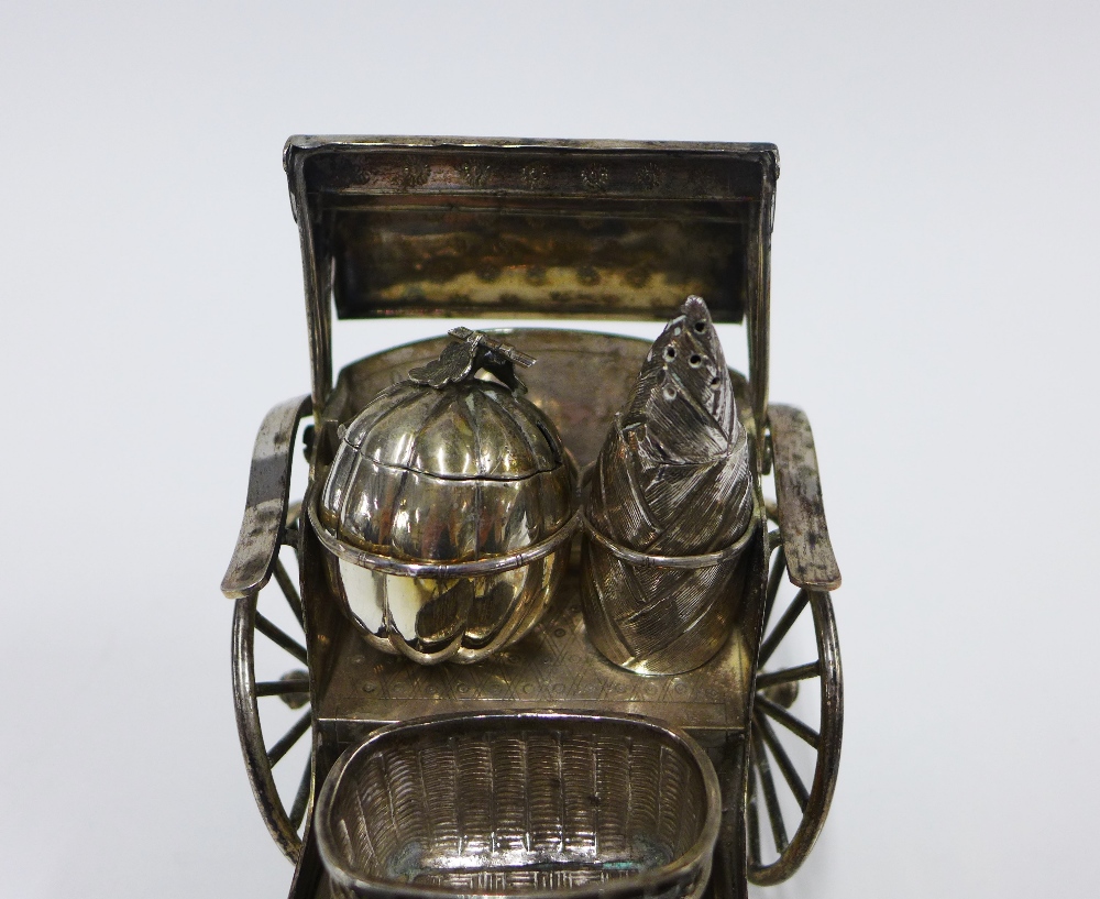 Luen-Wu, Shanghai, a Chinese silver rickshaw with cruets, stamped marks to base, 19cm long - Image 2 of 4