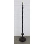 Chinese bronze patinated standard lamp, knop stem on a circular base, height excluding fitting 145cm