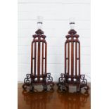 A pair of chinoiserie wooden table lamp bases, 47cm (2)