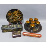 Chinese and Japanese lacquered and papier mache items to include a glove box, pen tray, goblets,