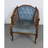 French style tub chair with bergere sides and button upholstered back and seat, on cabriole legs, (