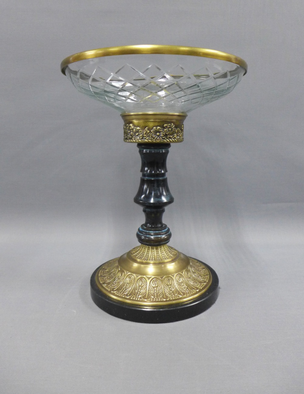 Table centre piece with a cut glass bowl on a hardstone column with brass mounts, 33cm