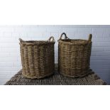 A pair of cylindrical woven baskets with handles to the top rim, ex Leanach Cottage, Culloden