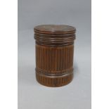 Turned wood cylindrical box and cover with incised geometric pattern, 12cm