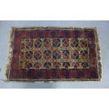 Yomut rug, central panel with geometric allover pattern within red border, 145 x 88cm