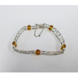 An Art Deco white gold, pearl and citrine bracelet, inscribed 1937