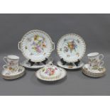 Collection of Dresden floral patterned table wares to include two cake plates, muffin dish and