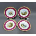 Set of four Minton porcelain cabinet plates, with landscape scenes within puce and gilt borders,