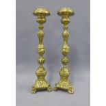 A pair of brass knop stemmed ecclesiastical style candlesticks, 48cm (2)