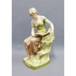 Royal Dux Art Nouveau figure of a girl reading a book, with pink triangle backstamp and impressed