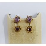 Two pairs of 9ct gold earrings, set with garnet and amethyst (2)