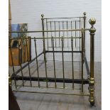 Late 19th / early 20th century brass bed, double, with sprung base and side rails, no mattress,