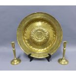 17th century Nuremburg brass alms dish, circa 1650 and a pair of brass knop stemmed candlesticks,