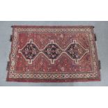 Persian wool rug, red field with triple pole medallions, 150 x 98cm