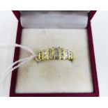 Contemporary 18ct gold and diamond ring, set with a rows of baguette and bright cut diamonds, UK