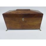 19th century mahogany sarcophagus tea caddy, hinged lid opening to reveal two lead lined divisions