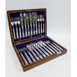 An Art Deco set of silver plated fish knives and forks, 12 of each in original wooden canteen,