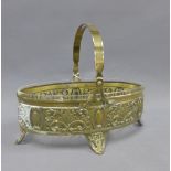 Brass WMF style basket with an oval glass liner, 27cm long