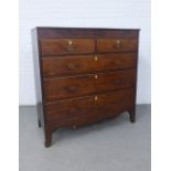 Early 19th century oak chest, the rectangular top with a reeded edge over two short and three