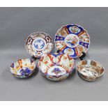 Collection of Imari patterned pottery to include scalloped edge bowls and plates, largest 28cm