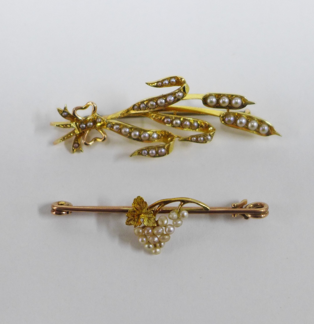 Victorian gold and pearl set bull rush brooch together with a Victorian gold and pearl set brooch