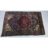 Bijar Rug, with central medallion and sapphire blue ground with allover foliate pattern and ivory