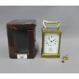 Brass cased carriage alarm clock with leather carry case 15cm including handle