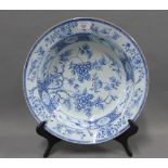 Chinese large blue white porcelain bowl with a greek key border and painted with birds and