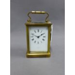 French carriage clock, brass cased with glass panels, enamel dial with Roman numerals height