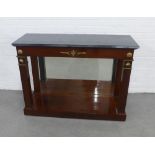 Empire style console table, with a black hardstone top, gilt metal motifs and conforming