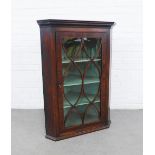 19th century mahogany corner cabinet with a glazed door, green painted interior and boxwood banding.