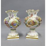 Pair of Carl Thieme floral encrusted porcelain vases with gilt edged wavy rims and hand painted