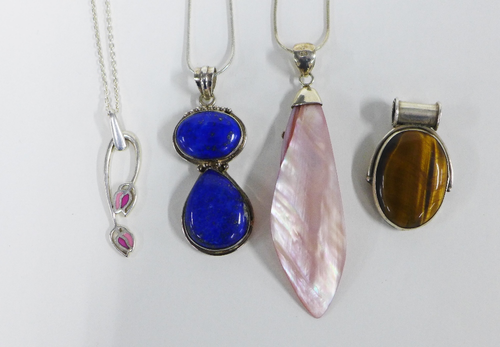 Four modern silver, shell and hardstone pendants, three on silver chains (4)