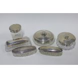 Silver silver topped glass dressing tables jars and boxes, various hallmarks and makers, largest