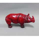 Royal Doulton flambe glazed Rhino, (a/f with hairline crack) 17cm long