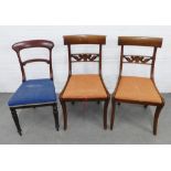 Pair of mahogany side chairs with scrolling spars and upholstered seats,on sabre legs together