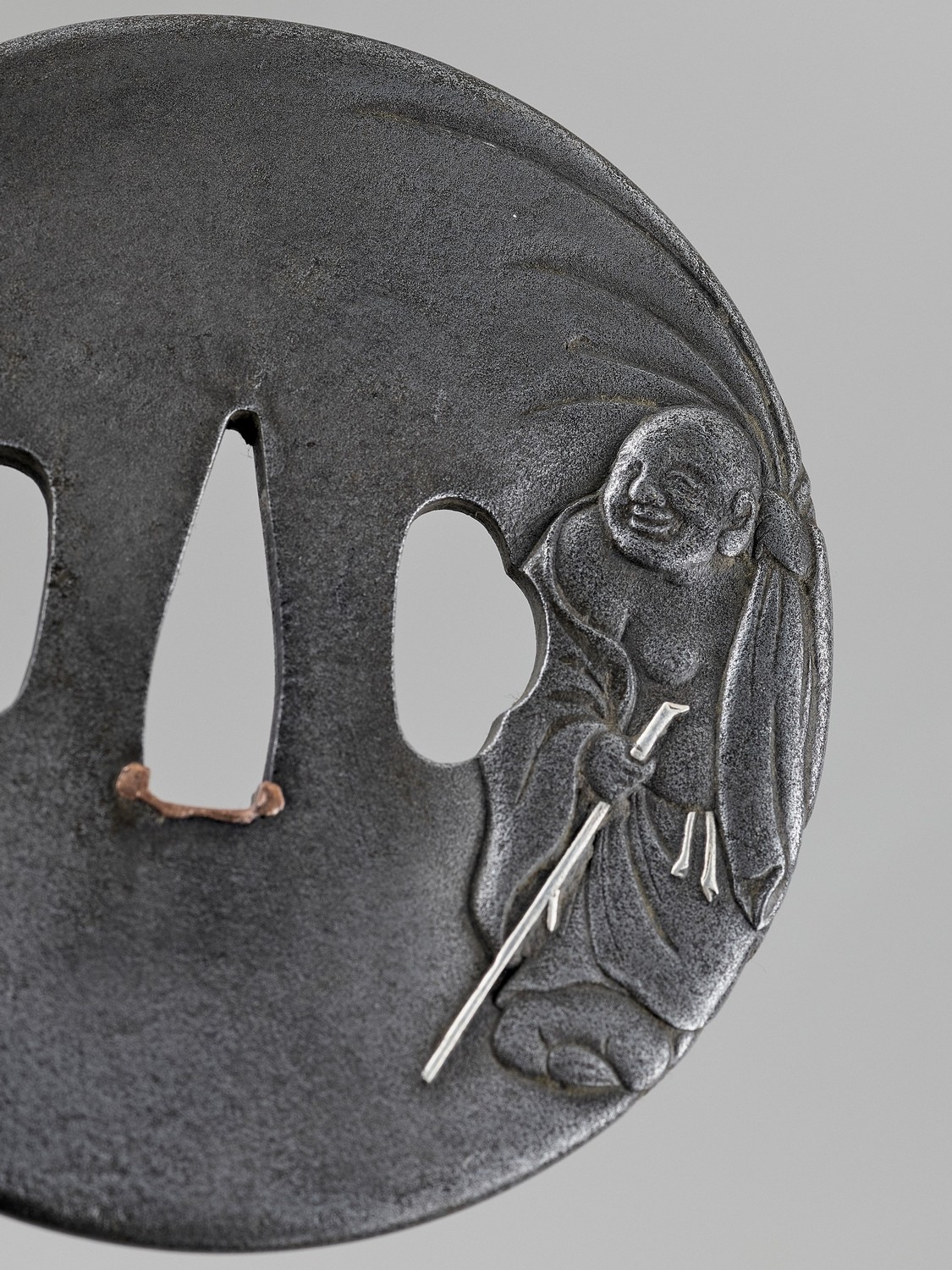 A SILVERED IRON TSUBA OF HOTEI - Image 2 of 4