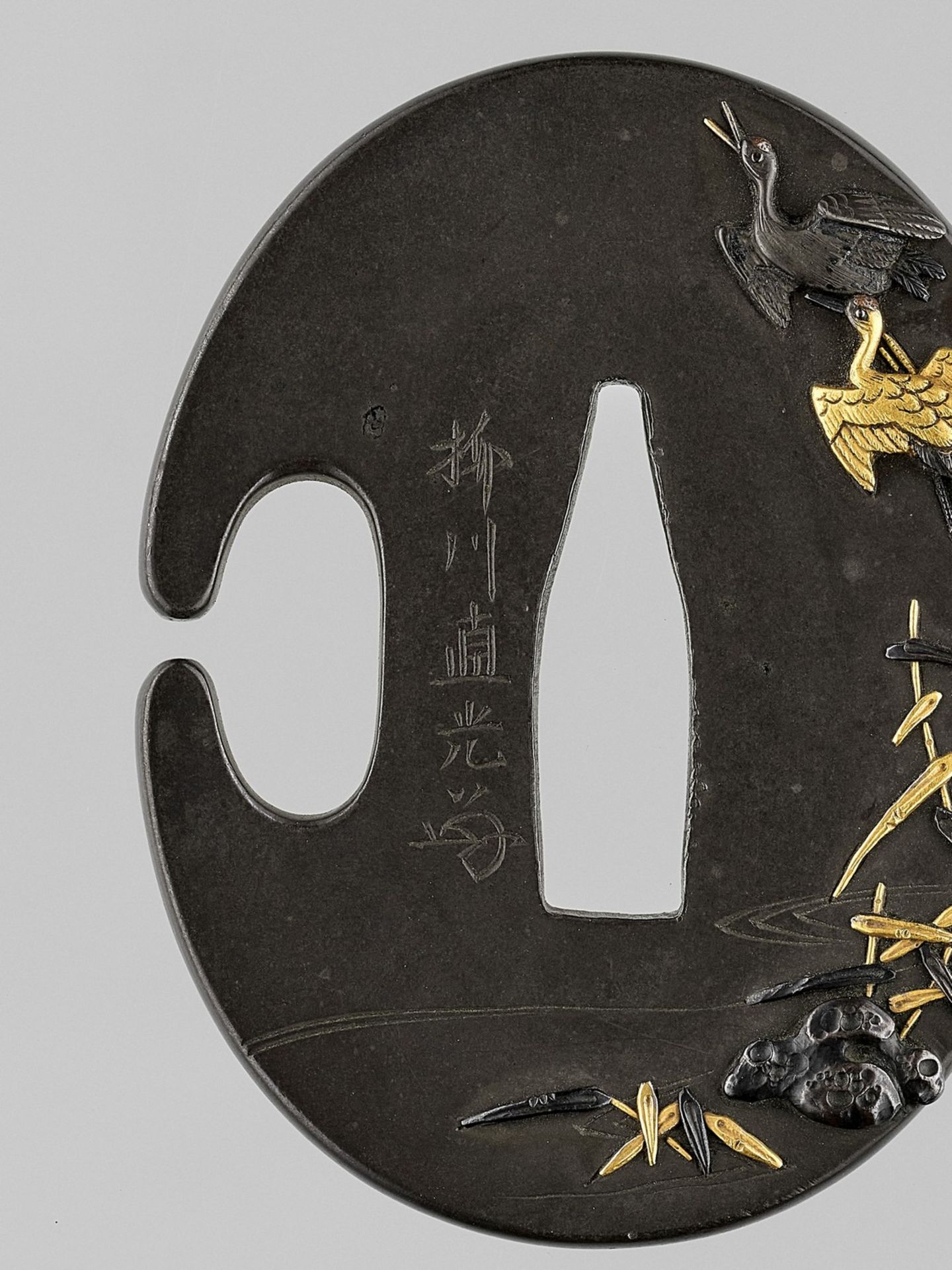 YANAGAWA NAOMITSU: A FINE GOLD-INLAID SHIBUICHI HAMIDASHI-TSUBA WITH FLYING CRANES - Image 4 of 4