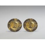 TWO IMPRESSIVE GILT METAL PLATES WITH BENTEN AND DRAGON