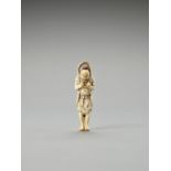 AN IVORY NETSUKE OF A NIO GUARDIAN WITH LARGE WARAJI