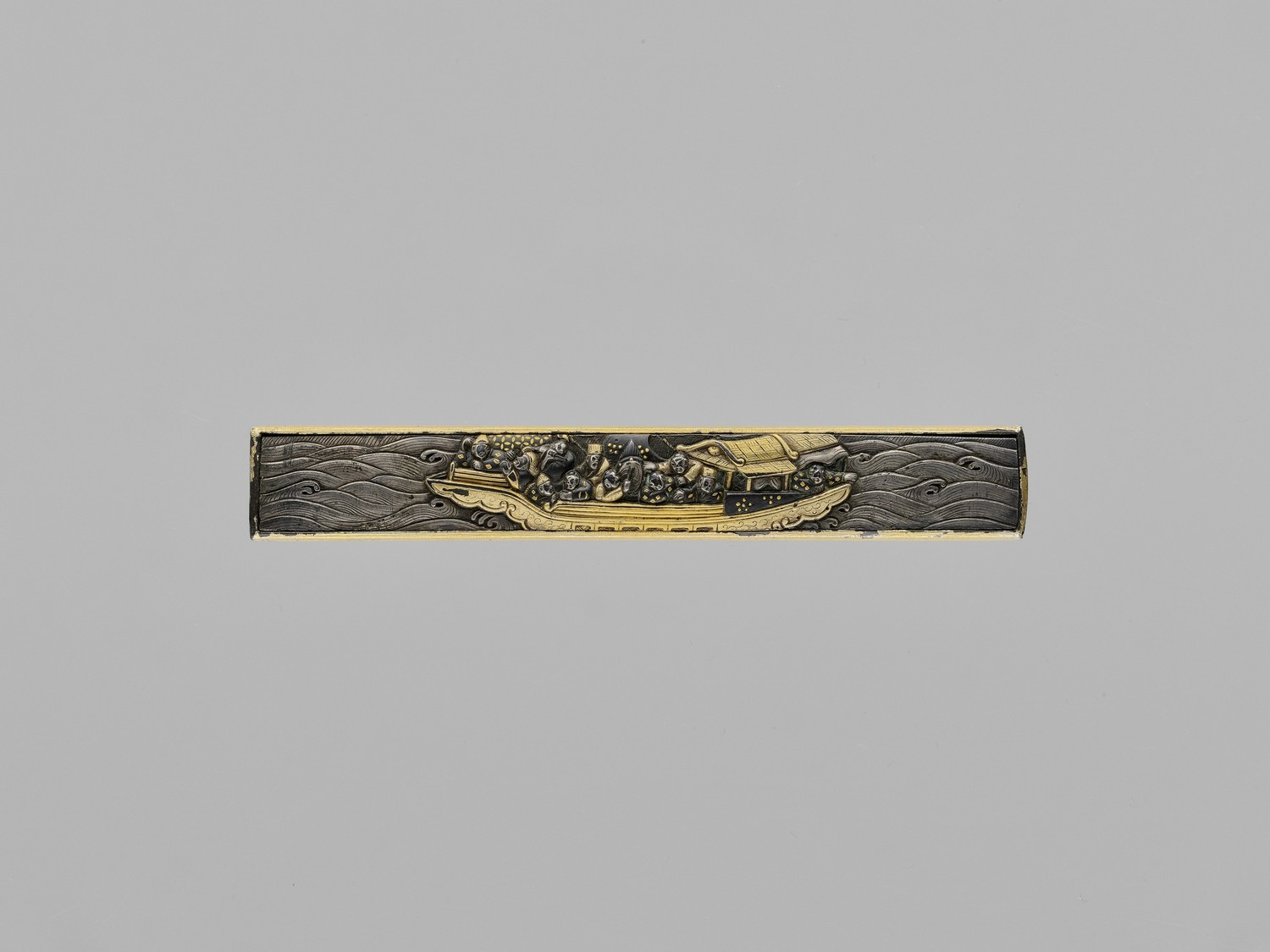 A FINE GILT SHIBUICHI KOZUKA WITH PLEASURE BOAT